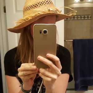 Beat up straw cowgirl seashell hat